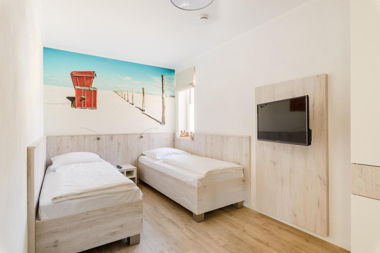 Nordsee-Ferienwohnungen Hinrichsen フースム エクステリア 写真